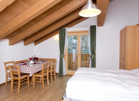 Residence Civetta zona giorno con divano-letto aperto